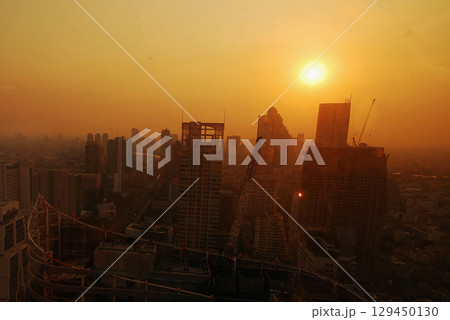 Sunset Amazing Bangkok city skyline with blue sky. Golden time Beautiful skyscraper bangkok midtown landscape. Capital building background modern office district. downtown City night life 129450130