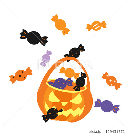 ハロウィンのカボチャのお菓子入れからキャンディがこぼれるイラスト 129451871