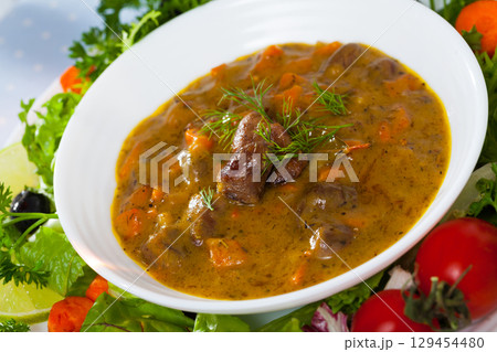 Chicken heart goulash 129454480