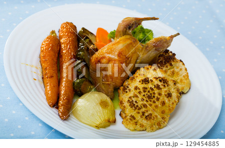 Grilled wildfowl with roasted vegetables Grilled wildfowl with roasted vegetables 129454885