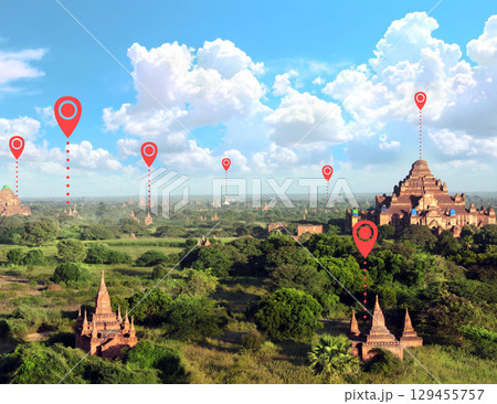 Planning tourist trip in Bagan, Myanmar. Top view on ancient stupas in Pagan, Burma and location pins. Global positioning system pin map. Travel way, point navigation. Modern travel, sightsee, tourism 129455757