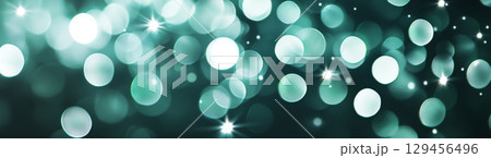 Abstract background with glowing teal bokeh circles for festive atmosphere 129456496