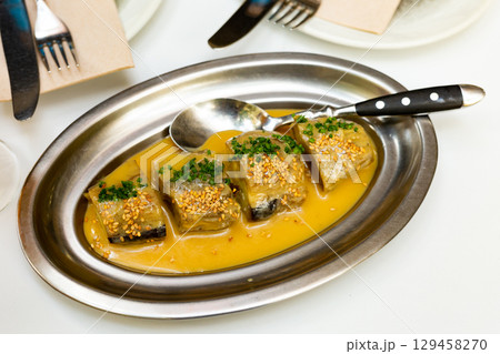 Eggplants with miso sauce on metal plate Eggplants with miso sauce on metal plate 129458270