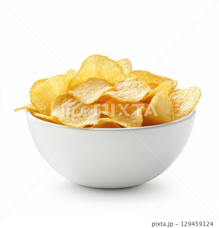Fresh potato chips in bowl isolated on white background. Snack and junk food Fresh potato chips in bowl isolated on white background. Snack and junk food 129459124