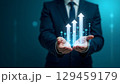 Hyper-realistic image of a businessman with growth symbols and digital elements 129459179