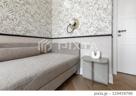 Cozy Corner with Sofa, Sconce and Designer Table Cozy Corner with Sofa, Sconce and Designer Table 129459790