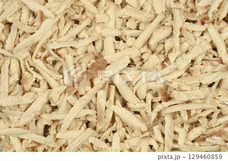 Finely grated smoked tofu 129460859
