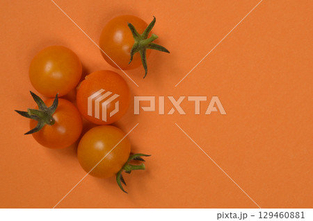 Fresh orange cherry tomatoes Fresh orange cherry tomatoes 129460881