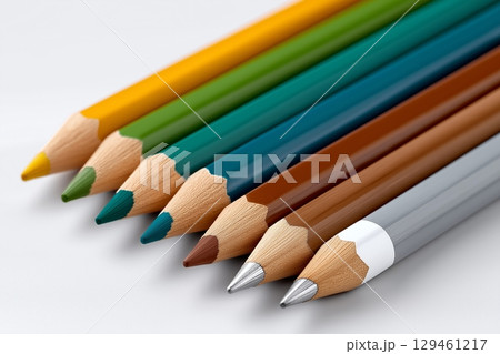 A set of colorful wooden pencils arranged on a white surface. Ideal for themes related to creativity 129461217