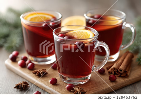Festive Red Drink In Mug With Orange Slice Cinnamon 129463762