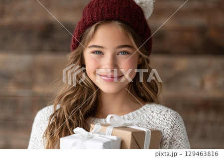 Innocent Girl Giving Gifts Blue Eyes, Pom Hat, Appreciation Innocent Girl Giving Gifts Blue Eyes, Pom Hat, Appreciation 129463816