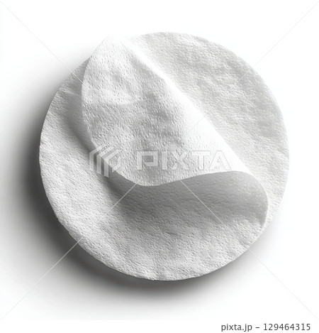 Clean White Circular Cotton Pad For Skincare Or Makeup Removal With Soft Texture And Simple Background 129464315