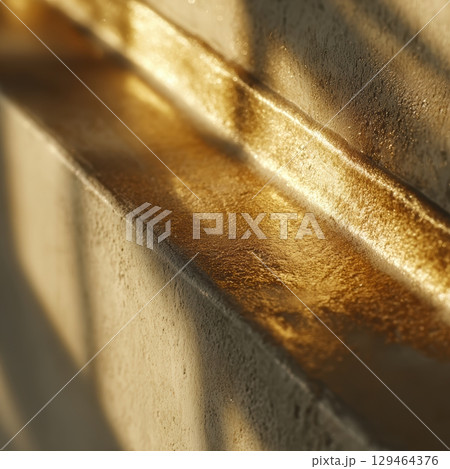 Golden Textured Surface High Resolution With Dramatic Light, Shadow, And Granular Finish Composition 129464376