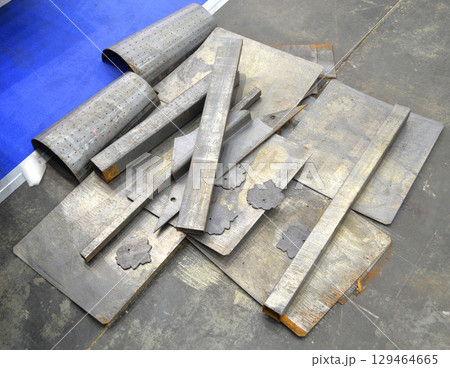 Sheet metal after laser cleaning of rust. A piece of metal after laser cleaning. Laser removed old rust from metal. Innovation metalworking technology. New technologies 129464665