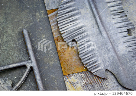 Sheet metal after laser cleaning of rust. A piece of metal after laser cleaning. Laser removed old rust from metal. Innovation metalworking technology. New technologies Sheet metal after laser cleaning of rust. A piece of metal after laser cleaning. Laser removed old rust from metal. Innovation metalworking technology. New technologies 129464670