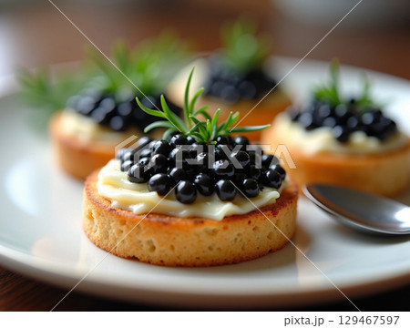 Close up Delicious Appetizing Caviar Canape on Plate Culinary Presentation 129467597