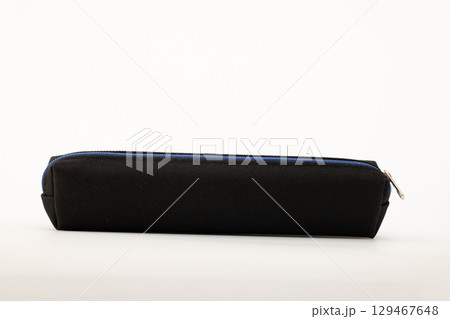 The case appears to be made of fabric or a similar material, with a zipper closure visible on one end 129467648