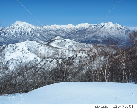 冬の飯縄山から望む高妻山・黒姫山・妙高山・火打山・焼山 129470301