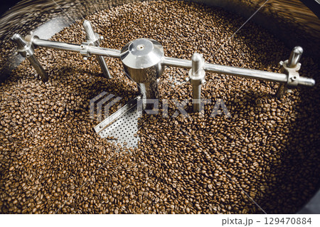 Cooling Drum of Coffee Roaster With Freshly Roasted Beans at Local Personal Roasting Factory, Overhead View 129470884