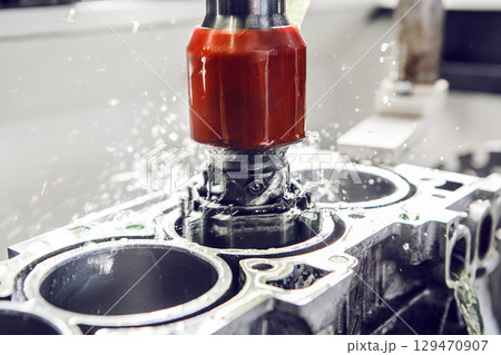 CNC Automatic Cylinder Honing Machine of engine. Car workshop, machine with a Computer numerical control. CNC Automatic Cylinder Honing Machine of engine. Car workshop, machine with a Computer numerical control. 129470907