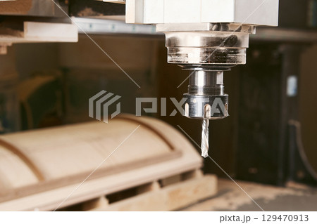 Cutting wood using a machine with numerical control. Cnc tool. Cutting wood using a machine with numerical control. Cnc tool. 129470913