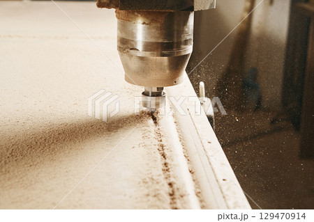CNC router machine creates a layout of the shelf complex. CNC router machine creates a layout of the shelf complex. 129470914