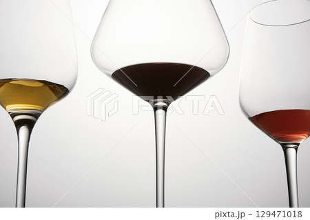 Red, white, pink wines assortment in glassware. 129471018