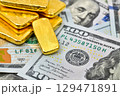 Paper us 100 dollar bill with gold bars, concept of investment and saving, wealth 129471891