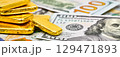 Paper us 100 dollar bill with gold bars, concept of investment and saving, wealth 129471893