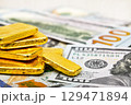 Paper us 100 dollar bill with gold bars, concept of investment and saving, wealth 129471894