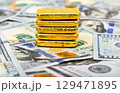 Paper us 100 dollar bill with gold bars, concept of investment and saving, wealth 129471895
