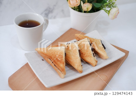 Toasted Chocolate Sandwich with Hot Tea Toasted Chocolate Sandwich with Hot Tea 129474143