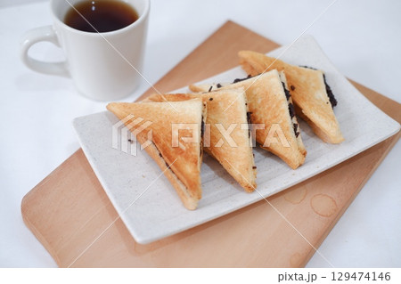 Toasted Chocolate Sandwich with Hot Tea 129474146