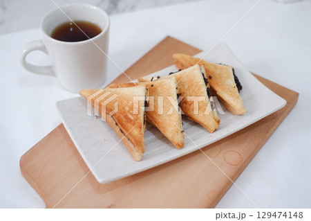 Toasted Chocolate Sandwich with Hot Tea 129474148