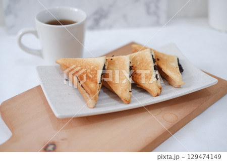Toasted Chocolate Sandwich with Hot Tea Toasted Chocolate Sandwich with Hot Tea 129474149