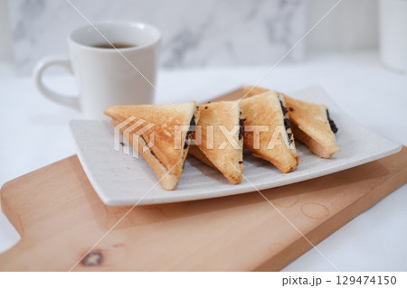 Toasted Chocolate Sandwich with Hot Tea Toasted Chocolate Sandwich with Hot Tea 129474150