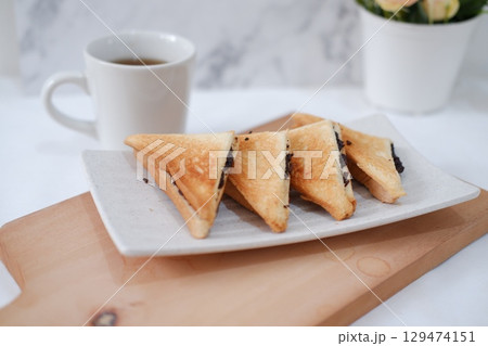 Toasted Chocolate Sandwich with Hot Tea 129474151