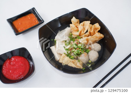 Bakso Noodle Soup with Wontons and Chili Sauce 129475100