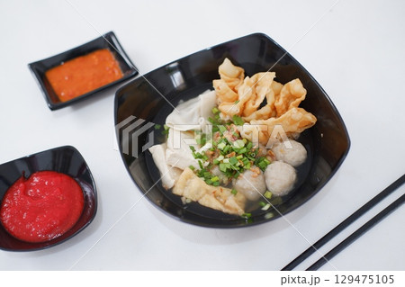 Bakso Noodle Soup with Wontons and Chili Sauce 129475105