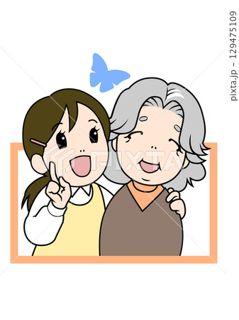 蝶を見つけて笑顔で眺める介護士と高齢者 129475109