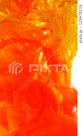 Colored Ink Abstract Shape Under the Water. Isolated on White Background. Vertical Aspect Ratio. 129478219