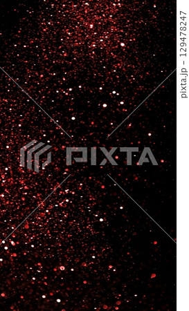 Abstract Red Bokeh Glitter Background. Defocused Blur Spot Lights Isolated on Black Background. Abstract Red Bokeh Glitter Background. Defocused Blur Spot Lights Isolated on Black Background. 129478247