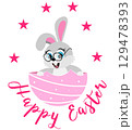Happy Easter. Easter bunny with glasses sits in eggshell with "Happy Easter" written on it. For banners, cards, social networks. Vector 129478393
