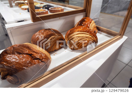 Various baked goods on display in a bakery Various baked goods on display in a bakery 129479026