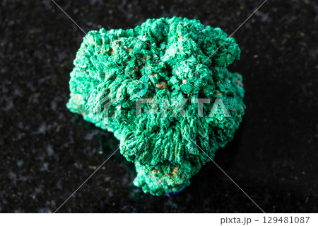 sample of crystalline malachite mineral on black 129481087