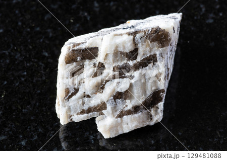 sample of raw written granite rock on black sample of raw written granite rock on black 129481088
