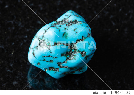 sample of tumbled turquenite mineral on black sample of tumbled turquenite mineral on black 129481187