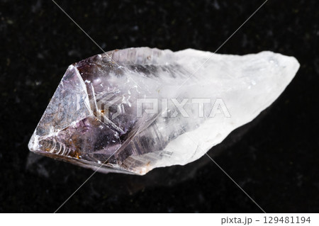 sample of rough amethyst quartz crystal on black sample of rough amethyst quartz crystal on black 129481194
