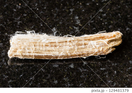 sample of rough chrysotile asbestos rock on black sample of rough chrysotile asbestos rock on black 129481379