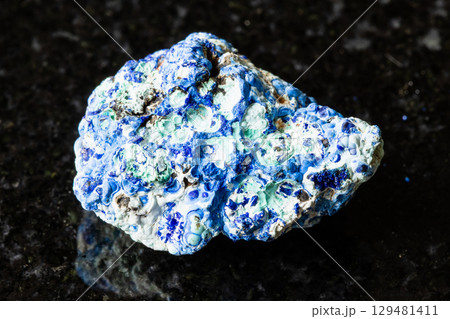 sample of rough azurite and gibbsite rock on black sample of rough azurite and gibbsite rock on black 129481411